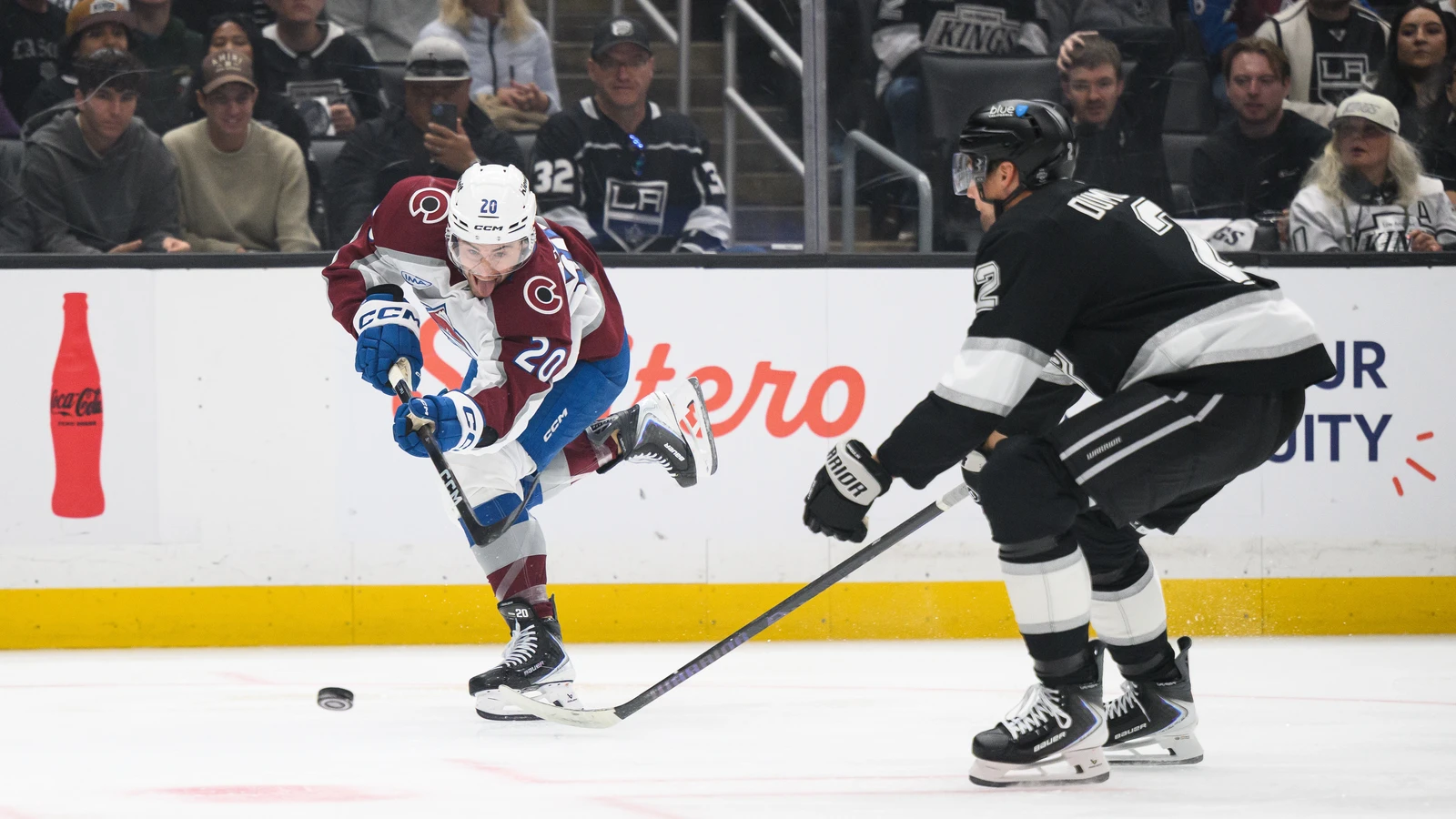 Brian Dumoulin defends for Los Angeles against Colorado during the 2026 playoffs. File photo.