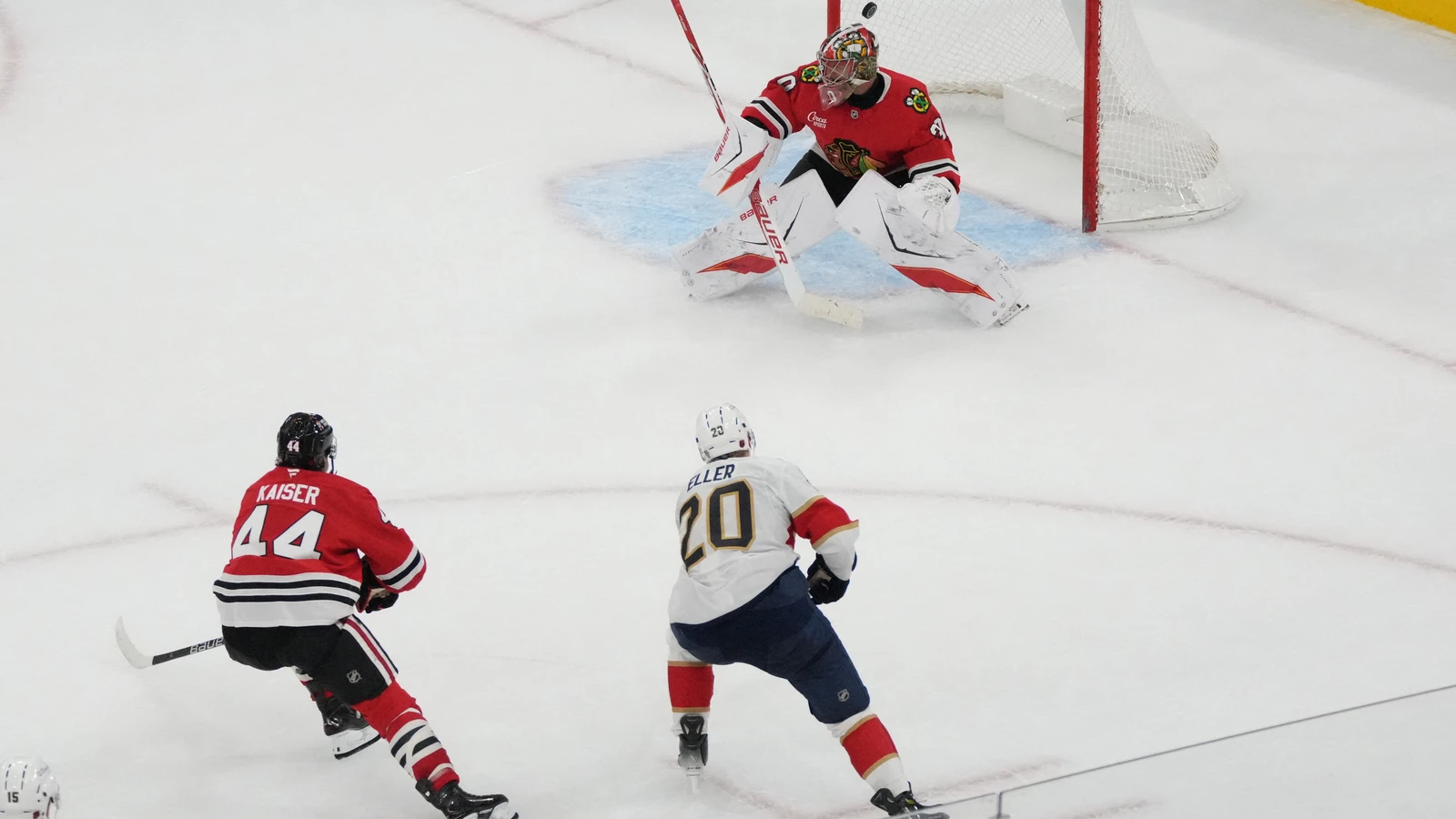 Florida Panthers centre Lars Eller shoots past Chicago Blackhawks goaltender Spencer Knight at United Center.