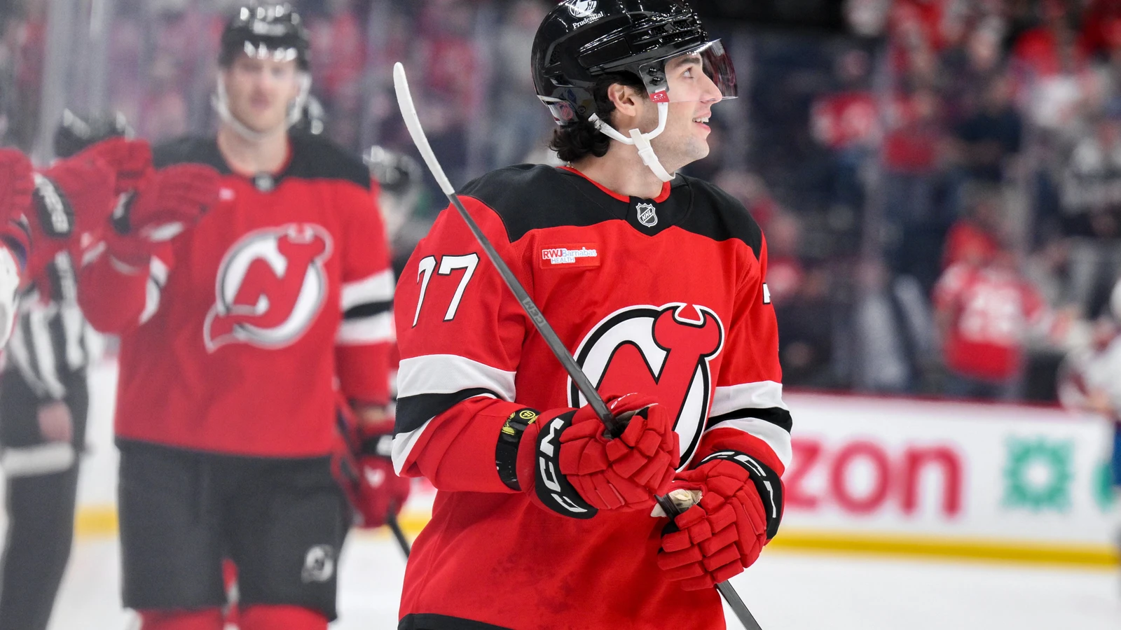 New Jersey Devils forward Luke Evangelista reacts after scoring against the Colorado Avalanche at Prudential Center.