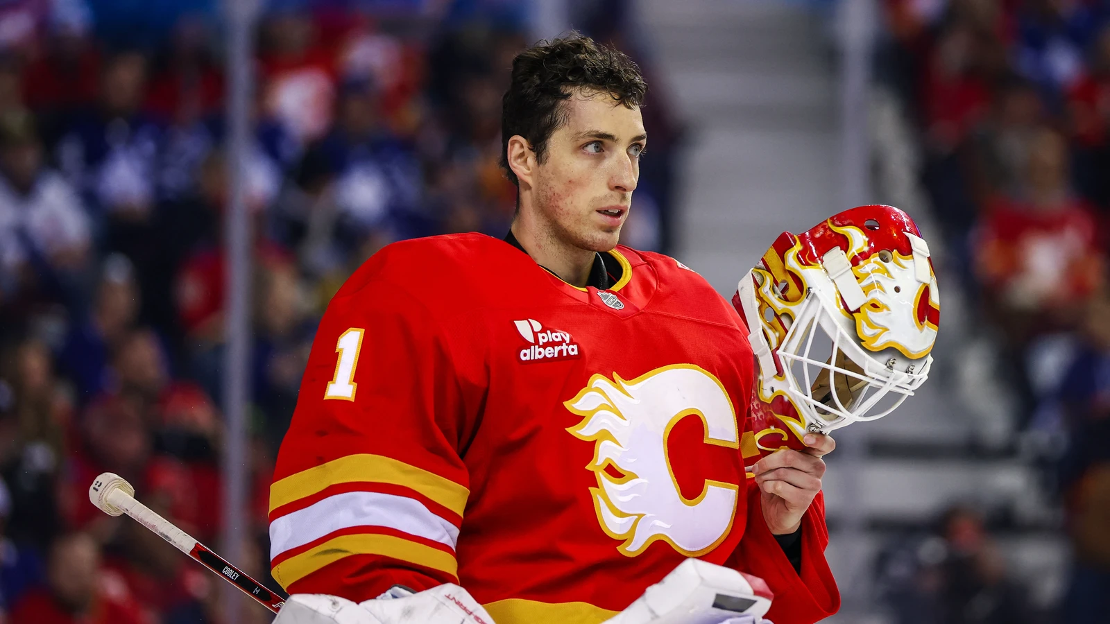 File photo: Calgary Flames goaltender Devin Cooley, mask off, looks across the ice during a game against the Toronto Maple Leafs at Scotiabank Saddledome.