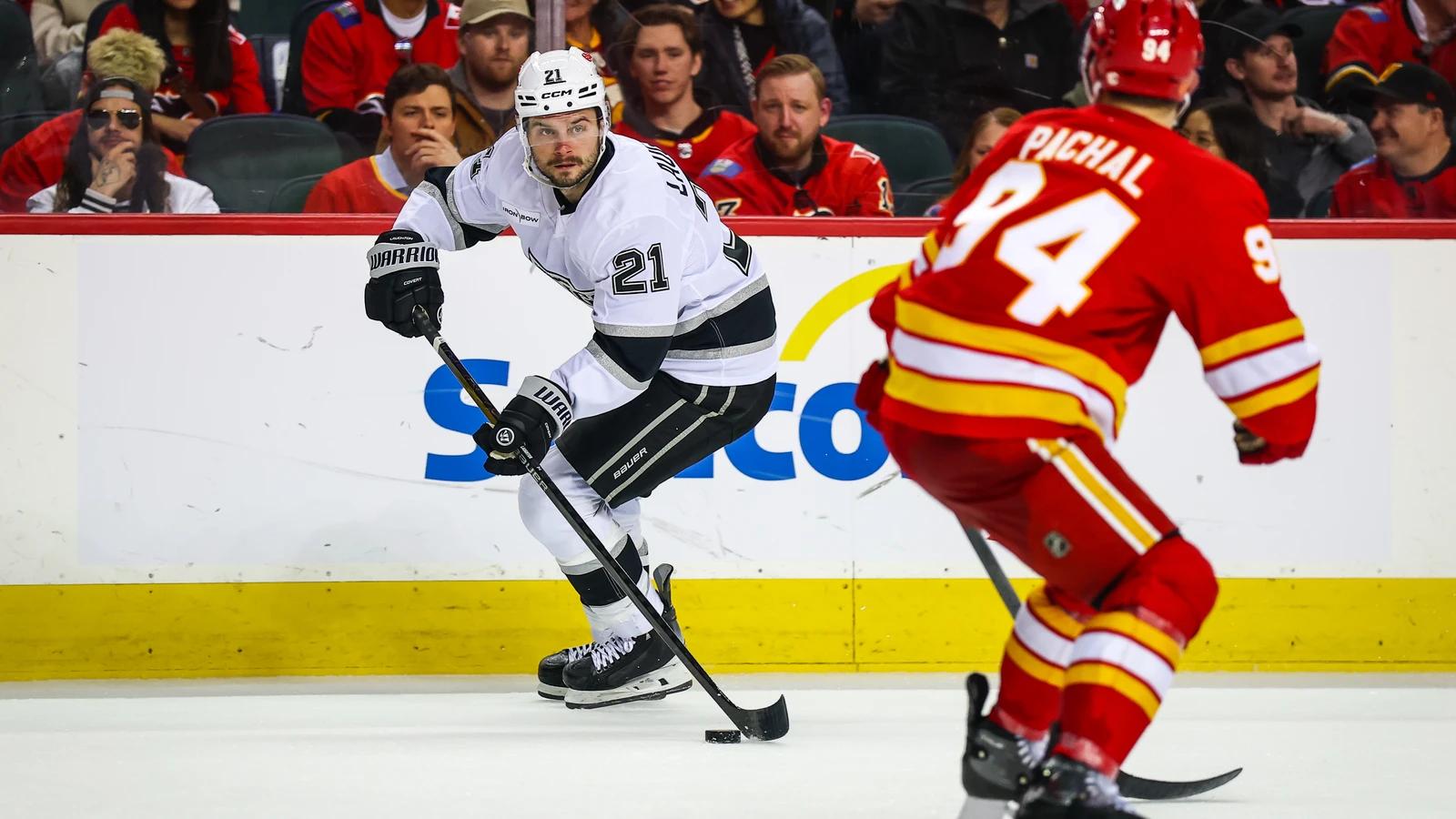 Scott Laughton skates for Los Angeles against Calgary at Scotiabank Saddledome on April 16, 2026. File photo.