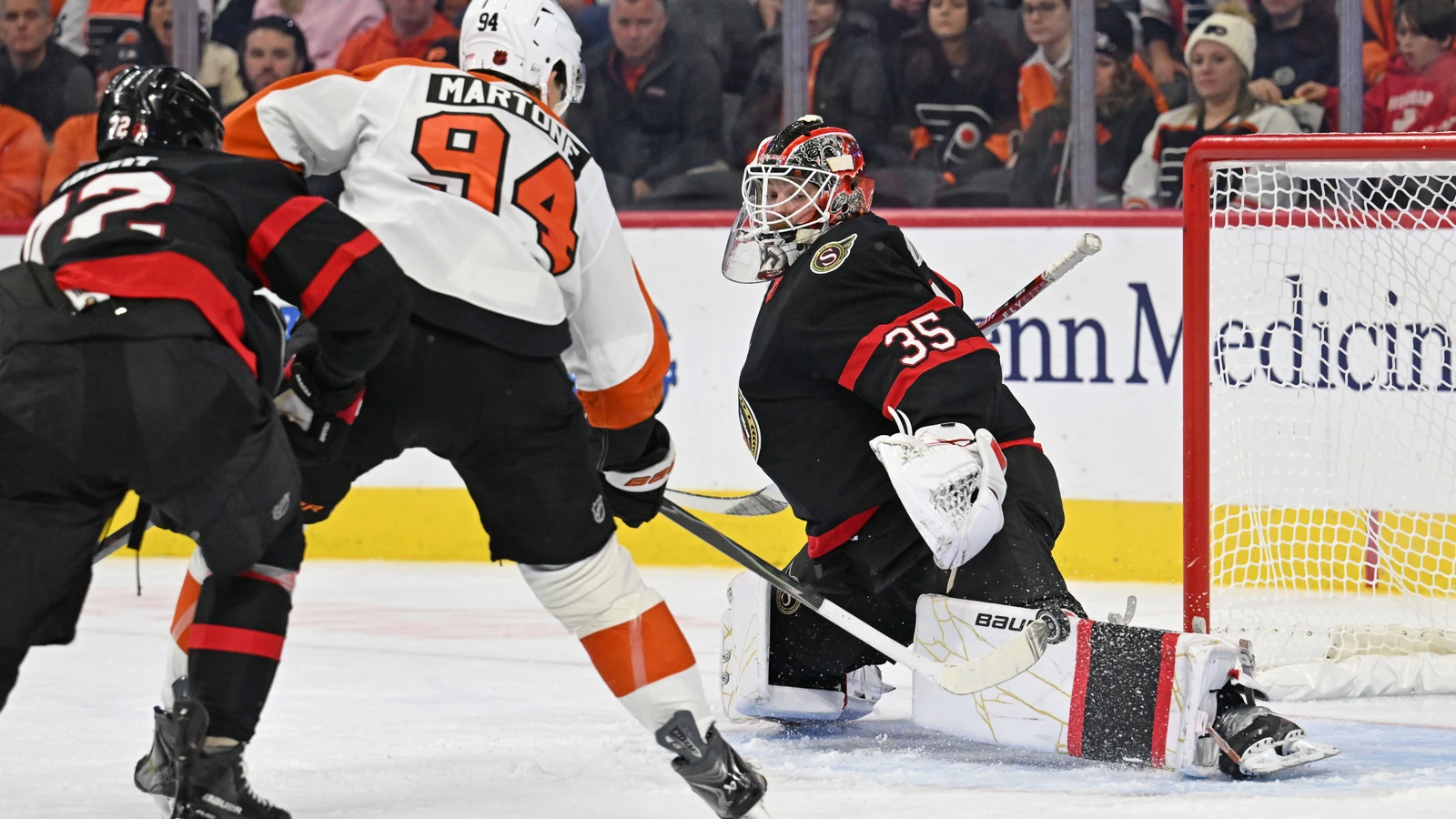 Philadelphia Flyers forward Porter Martone scores against Ottawa Senators goaltender Linus Ullmark.