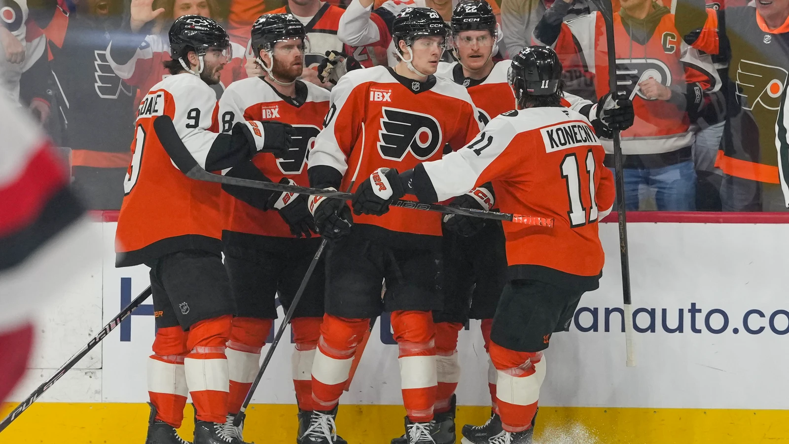 Alex Bump celebrates with Flyers teammates during a May 2026 playoff game. File photo.