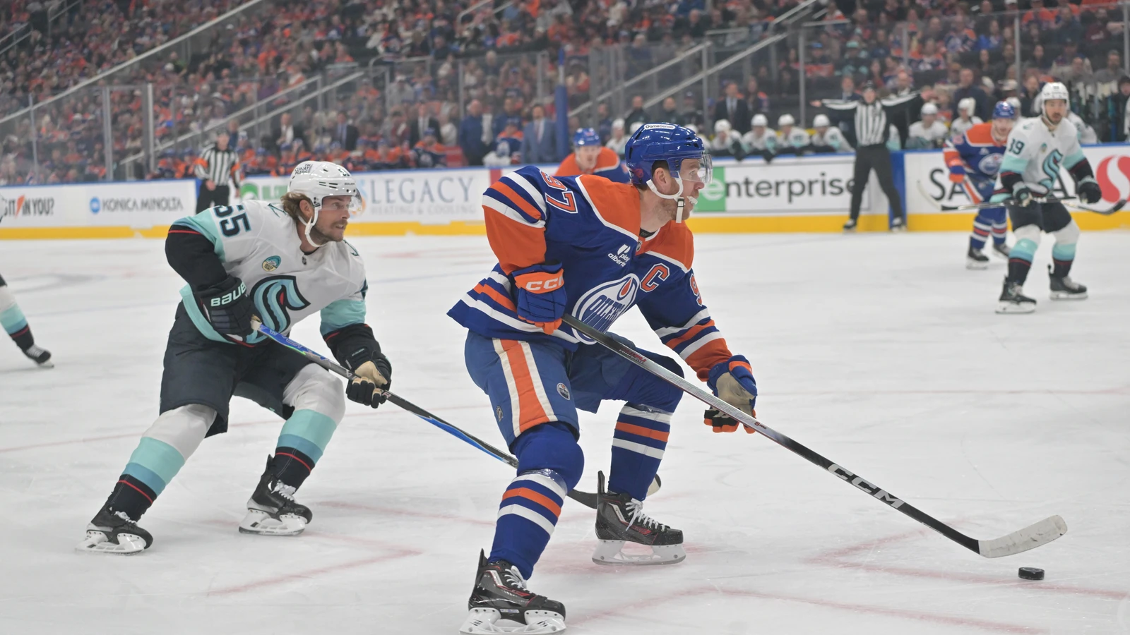 File photo: Edmonton Oilers captain Connor McDavid skates with the puck against the Seattle Kraken at Rogers Place.