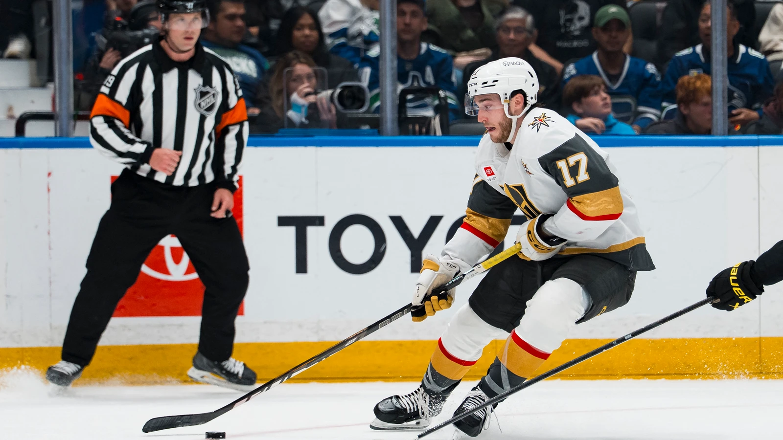 Marc Gatcomb of the Vegas Golden Knights controls the puck against the Vancouver Canucks at Rogers Arena.