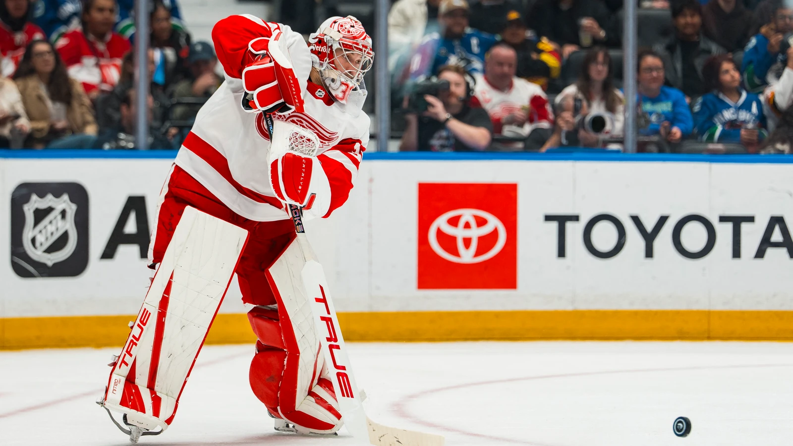 File photo: Detroit Red Wings goaltender John Gibson handles the puck at Rogers Arena in Vancouver.