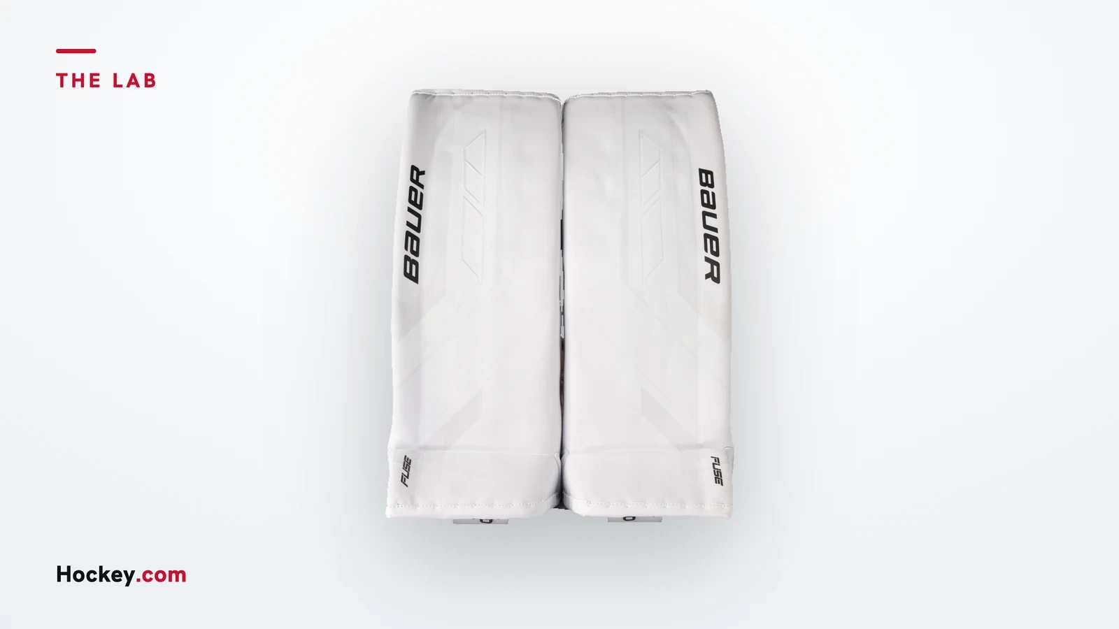 Bauer SUPREME FUSE senior goalie leg pads in white, official Bauer product photograph on a The Lab cover.