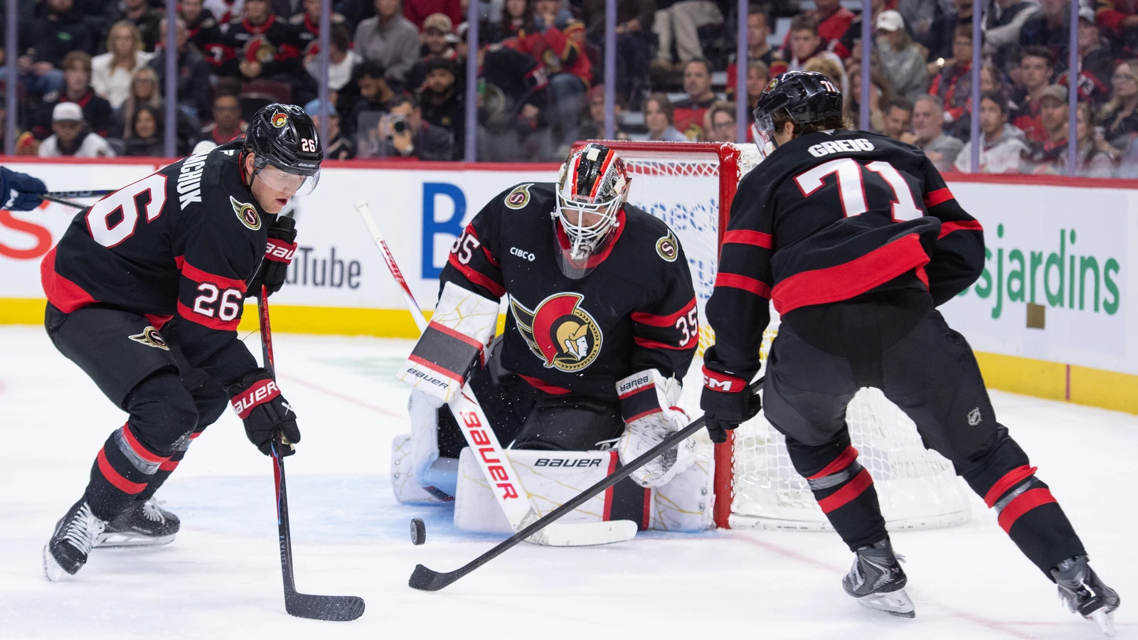 Ottawa Senators forward Ridly Greig (71) protects the puck near his own net against the Florida Panthers.