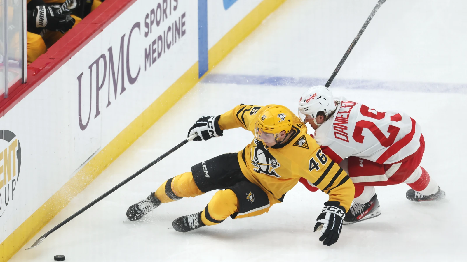 Nate Danielson battles Pittsburgh's Blake Lizotte for the puck during a Detroit Red Wings game on Jan. 1, 2026. File photo.
