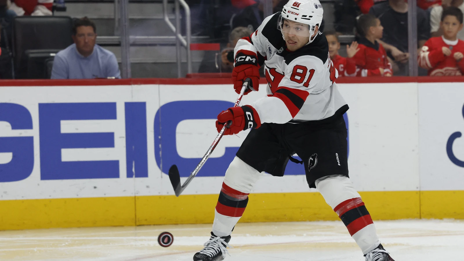 File photo: New Jersey Devils forward Arseny Gritsyuk shoots the puck against the Detroit Red Wings at Little Caesars Arena.