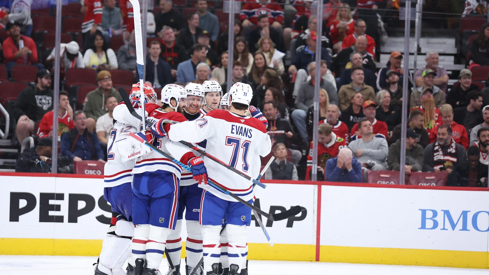 File photo: Montreal Canadiens players gather on the ice after a win over the Chicago Blackhawks at United Center.