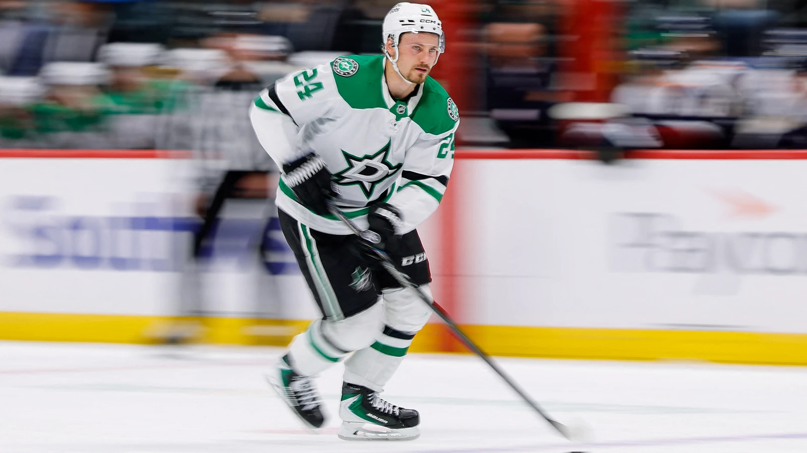 Roope Hintz controls the puck for the Dallas Stars during overtime against the Colorado Avalanche at Ball Arena.