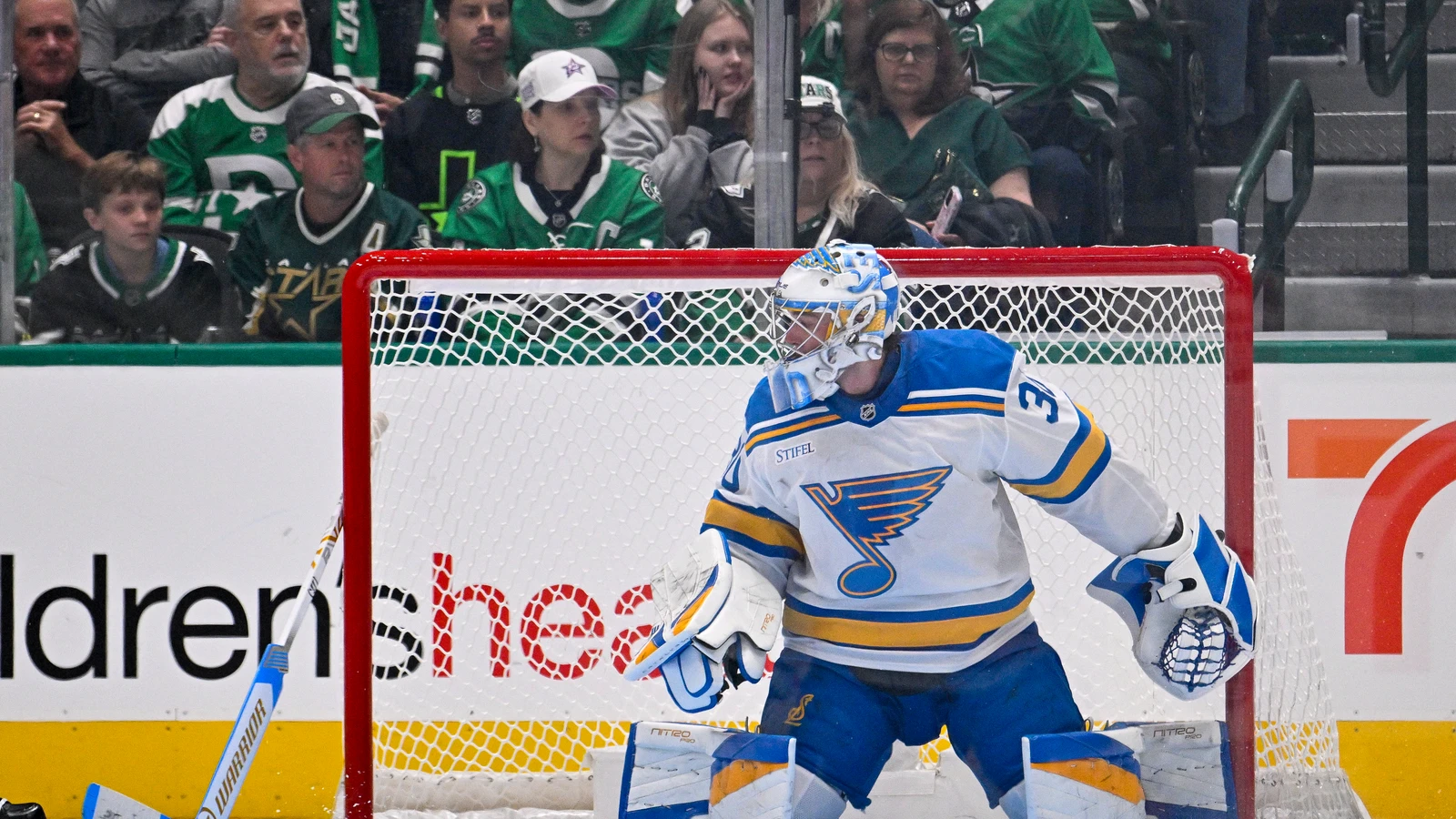 St. Louis Blues goaltender Joel Hofer watches the Dallas Stars attack without his stick during the third period at American Airlines Center.