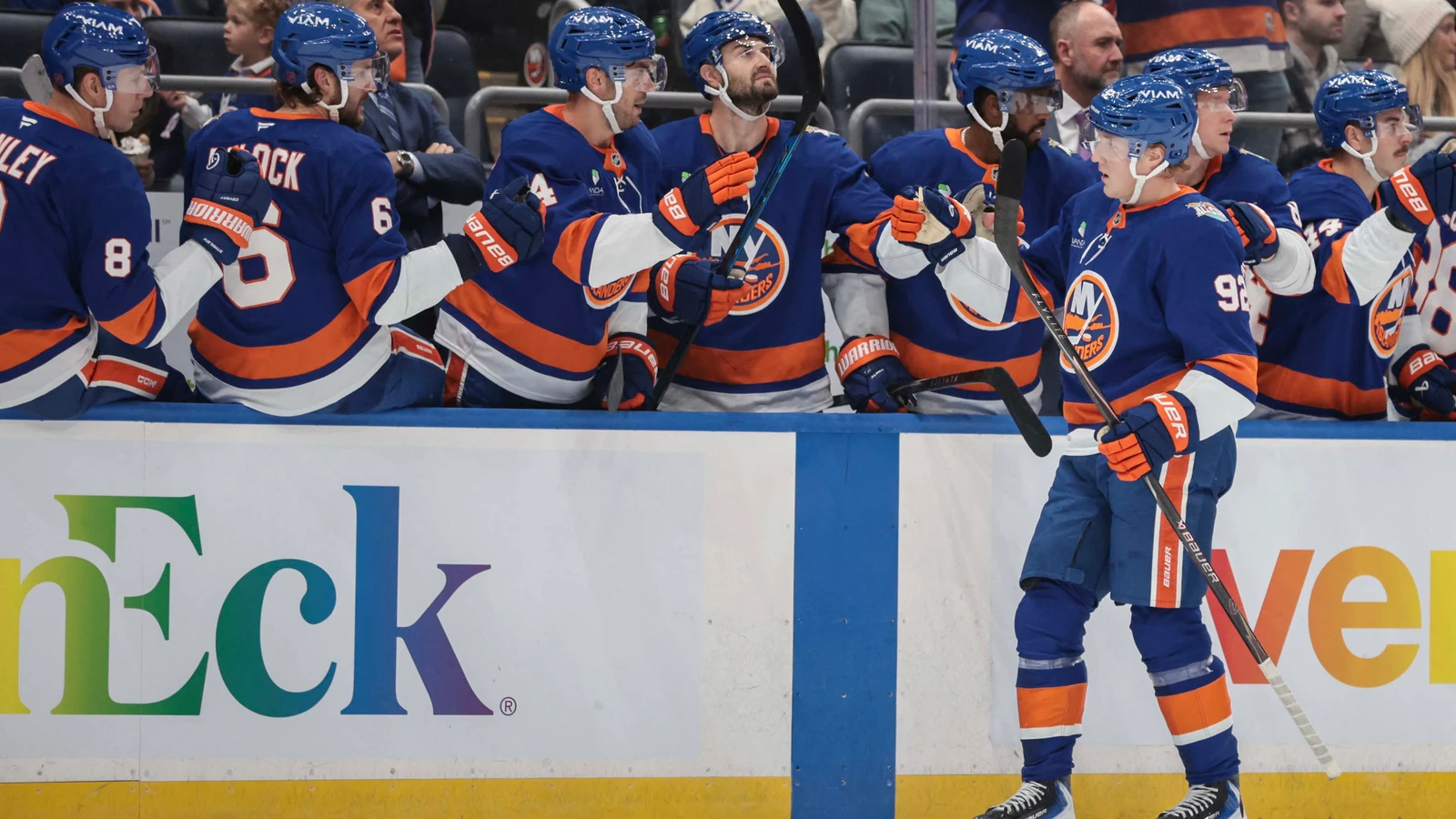 File photo: Simon Holmstrom celebrates a goal with Islanders teammates at the bench at UBS Arena.