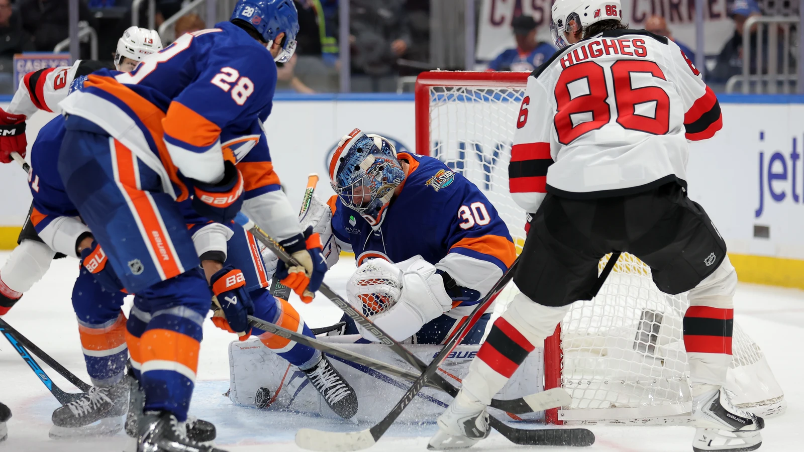 Ilya Sorokin makes a save for the New York Islanders against the New Jersey Devils at UBS Arena.