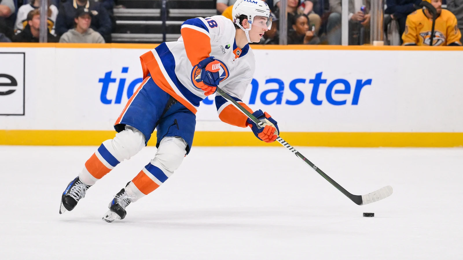 File photo: New York Islanders defenceman Matthew Schaefer skates with the puck against the Nashville Predators at Bridgestone Arena.