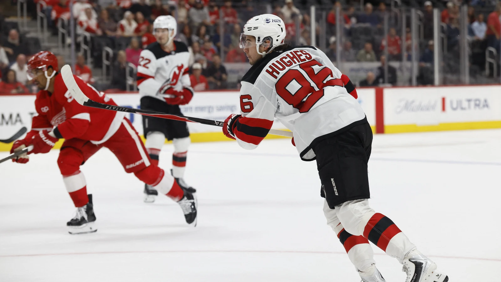 Jack Hughes takes a shot against the Detroit Red Wings at Little Caesars Arena.