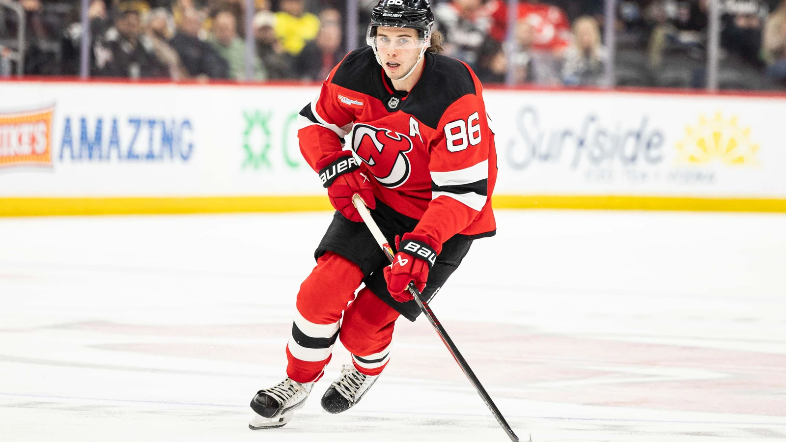 File photo: New Jersey Devils center Jack Hughes (86) skates with the puck against Pittsburgh at Prudential Center on Apr. 9, 2026.