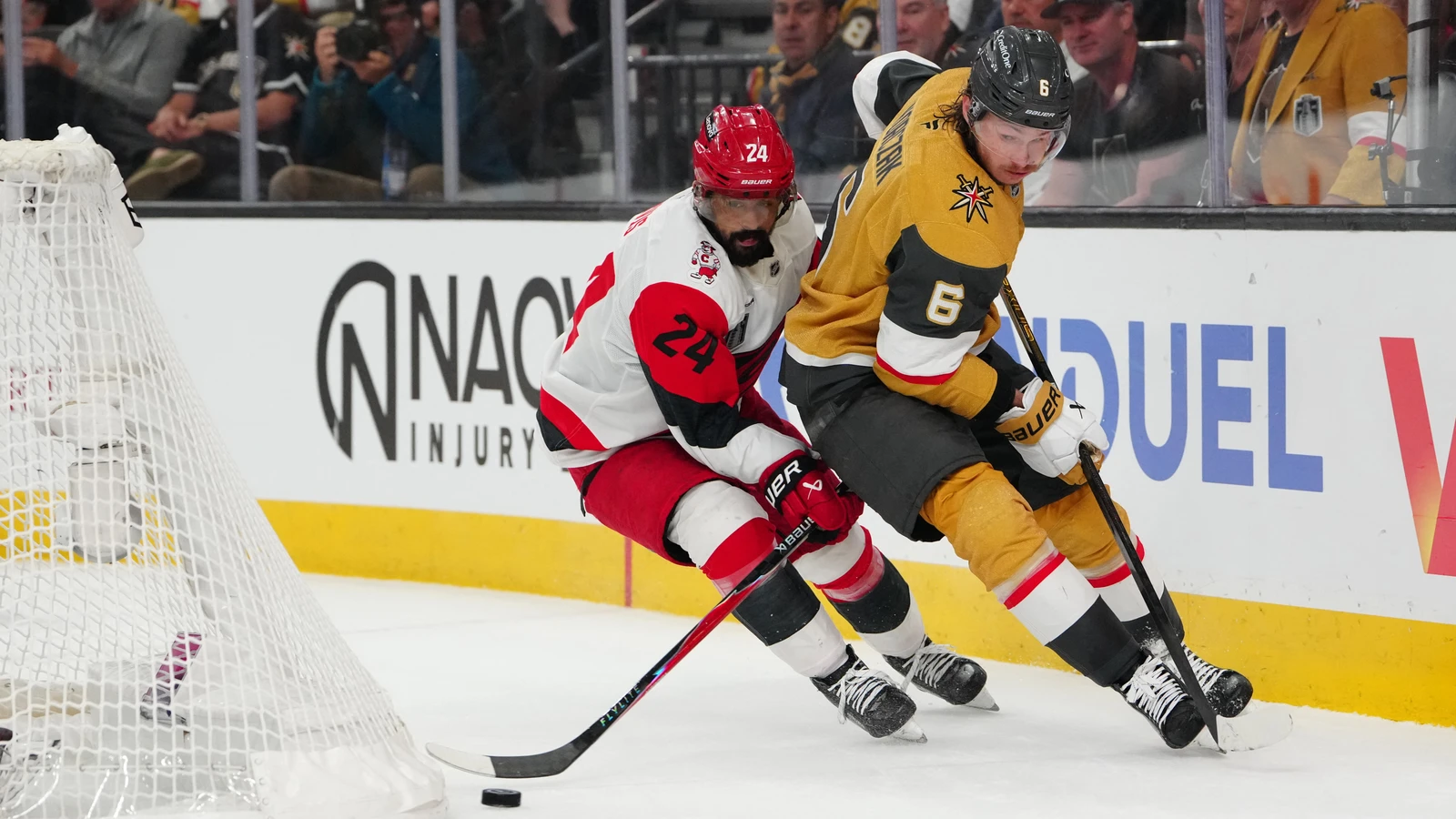 Seth Jarvis battles Kaedan Korczak for the puck during Game 6 of the 2026 Stanley Cup Final. File photo.