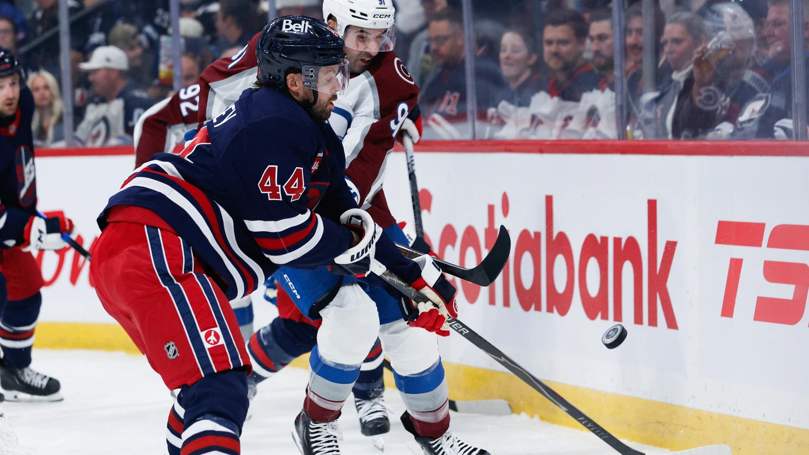 File photo: Winnipeg Jets defenceman Josh Morrissey contests the puck with a Colorado Avalanche player at Canada Life Centre.