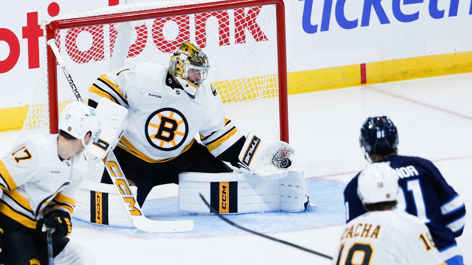 File photo: Kyle Connor shoots towards Boston Bruins goaltender Jeremy Swayman at Canada Life Centre in Winnipeg.