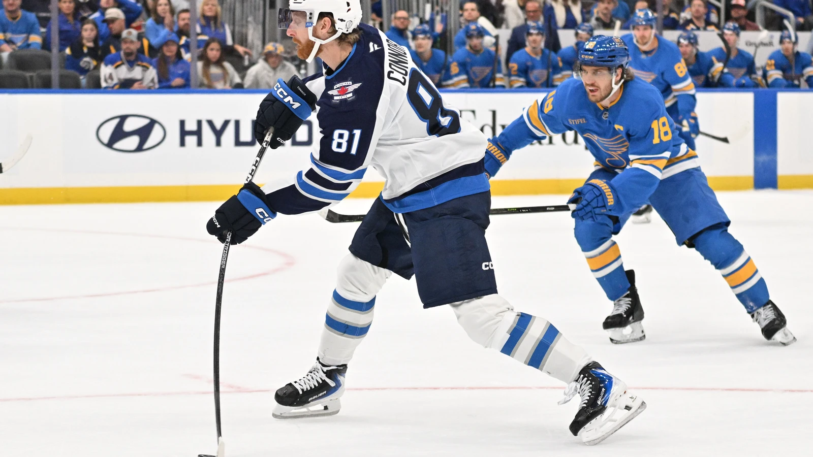 File photo: The Winnipeg Jets carry the puck against the St. Louis Blues at Enterprise Center.