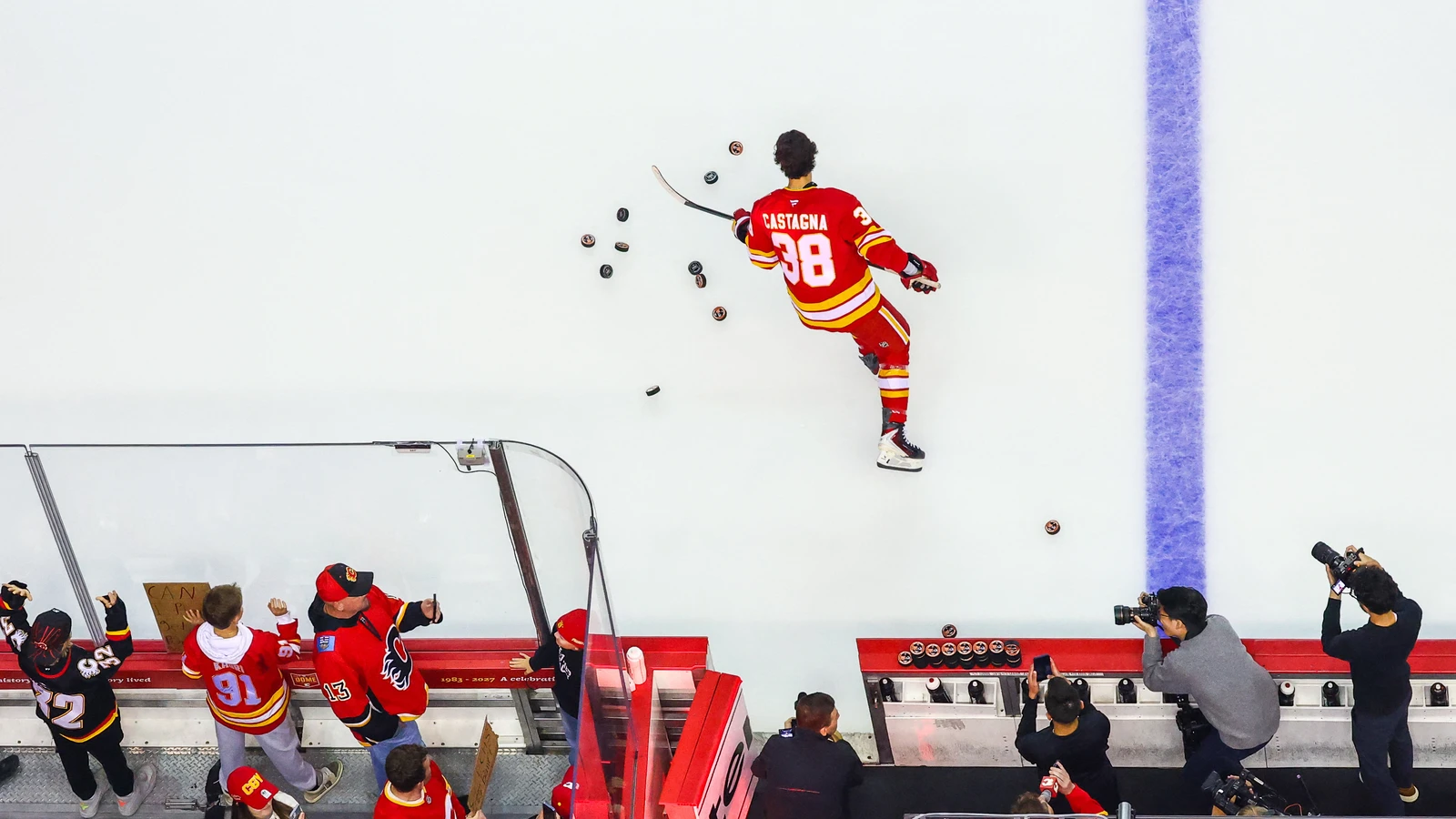 Jonathan Castagna skates his rookie lap in a Calgary Flames jersey before facing the Colorado Avalanche at Scotiabank Saddledome.