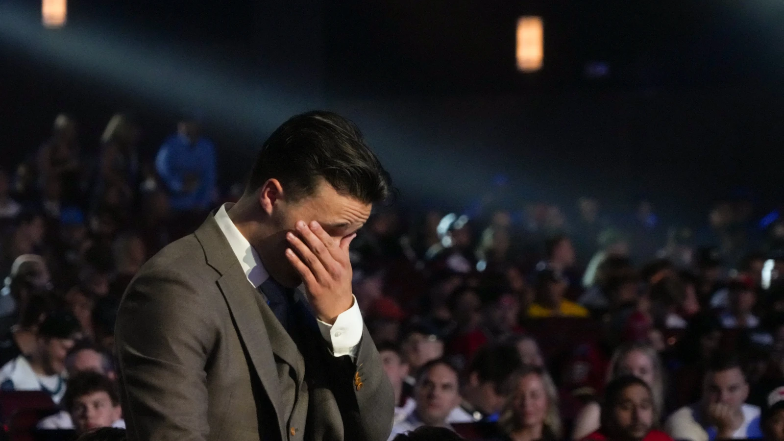 Justin Carbonneau reacts after the St. Louis Blues select him 19th overall at the NHL Draft on June 27, 2025. File photo.