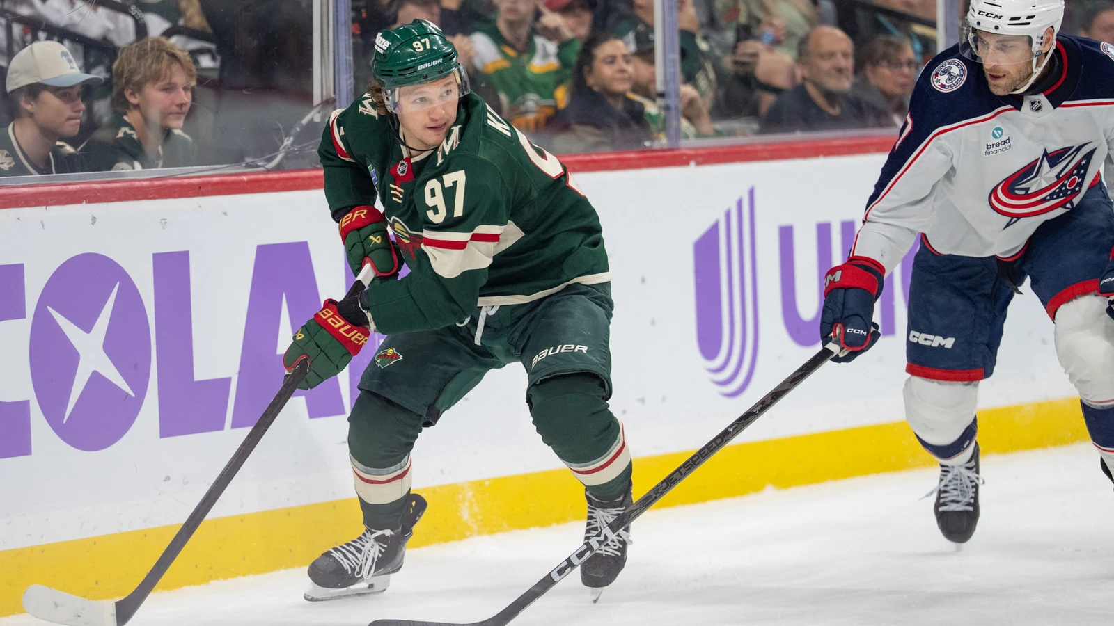 Minnesota Wild forward Kirill Kaprizov controls the puck beside Columbus Blue Jackets defenceman Carson Soucy at Grand Casino Arena on Oct. 18, 2026.