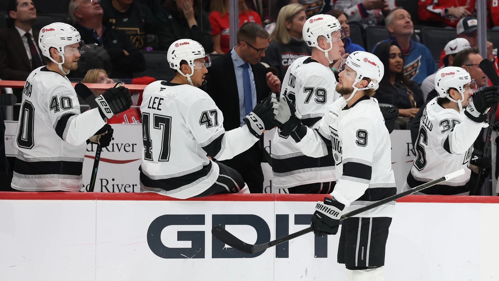 Los Angeles Kings forward Adrian Kempe celebrates his first-period goal with teammates at the bench in Washington.