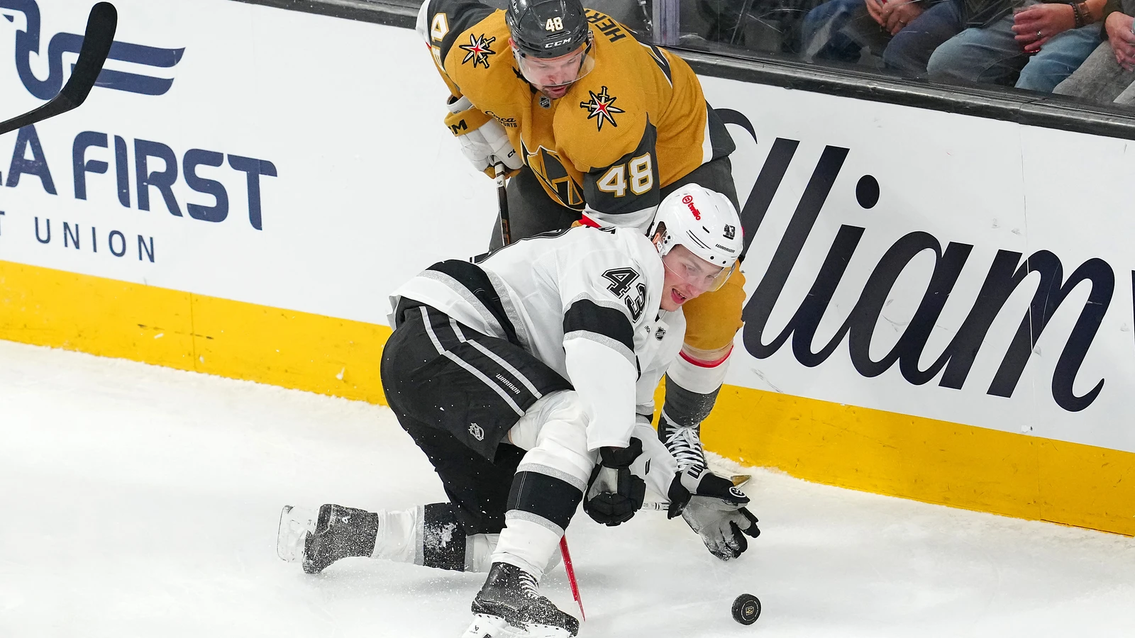 Los Angeles and Vegas players battle for the puck in February 2026. File photo.
