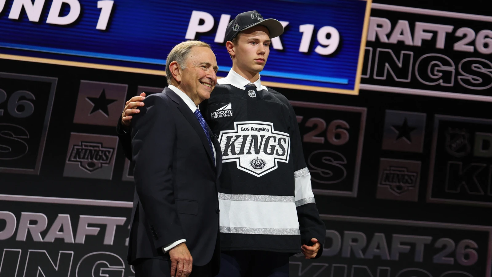 Elton Hermansson stands beside Gary Bettman after Los Angeles selects him 19th overall at the NHL Draft on June 26, 2026. File photo.