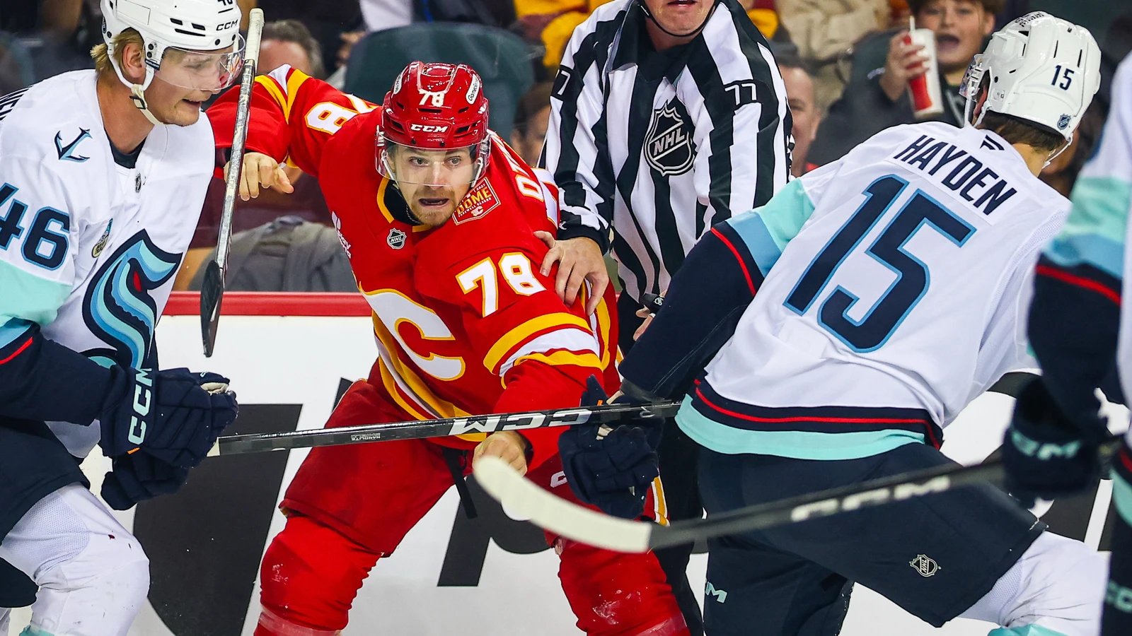 File photo: Seattle Kraken forward John Hayden fights Calgary Flames winger Brennan Othmann during a preseason game on Sept. 20, 2026.