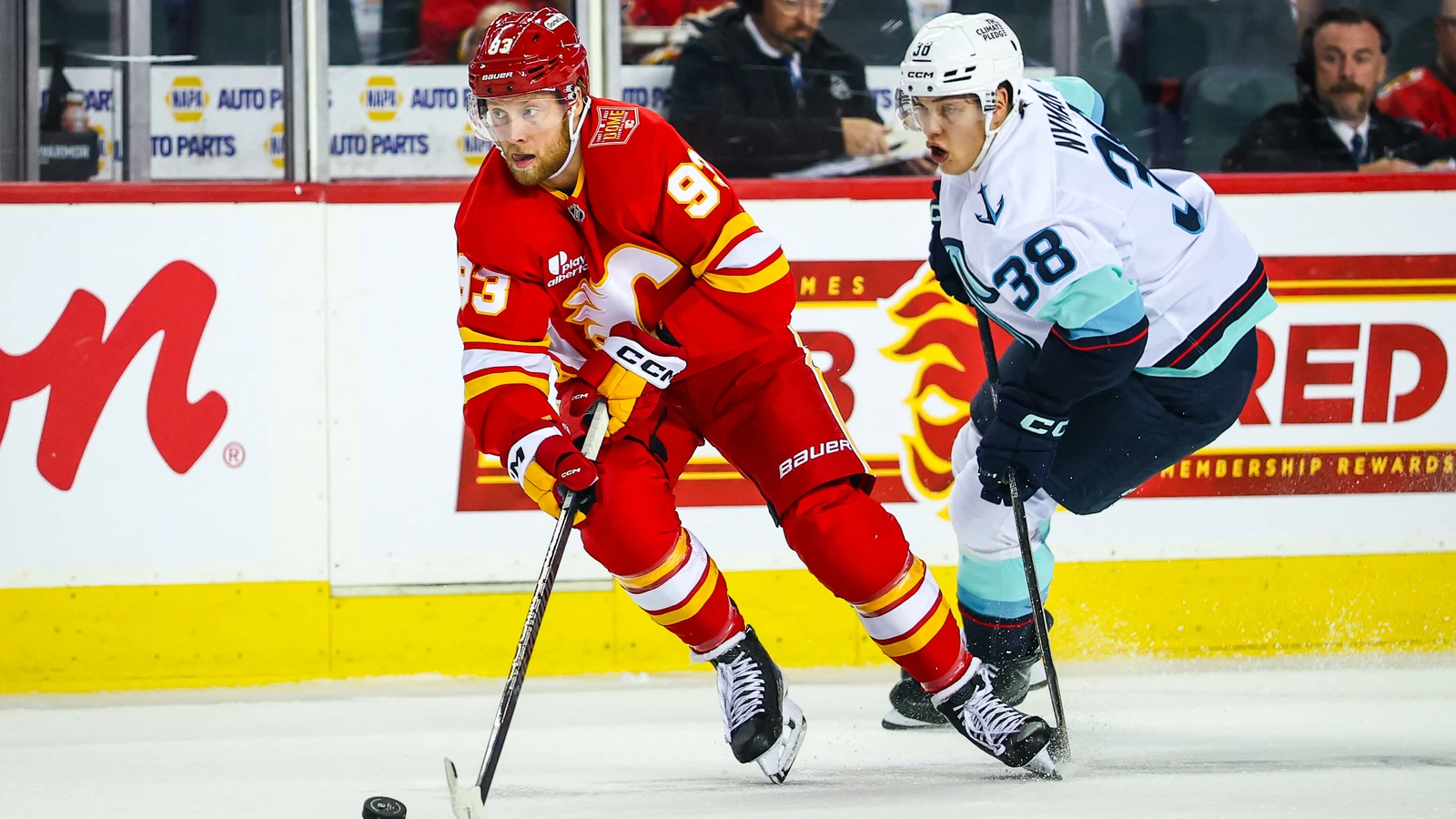File photo: Seattle Kraken forward Jani Nyman (38) pursues the puck against the Calgary Flames at Scotiabank Saddledome.