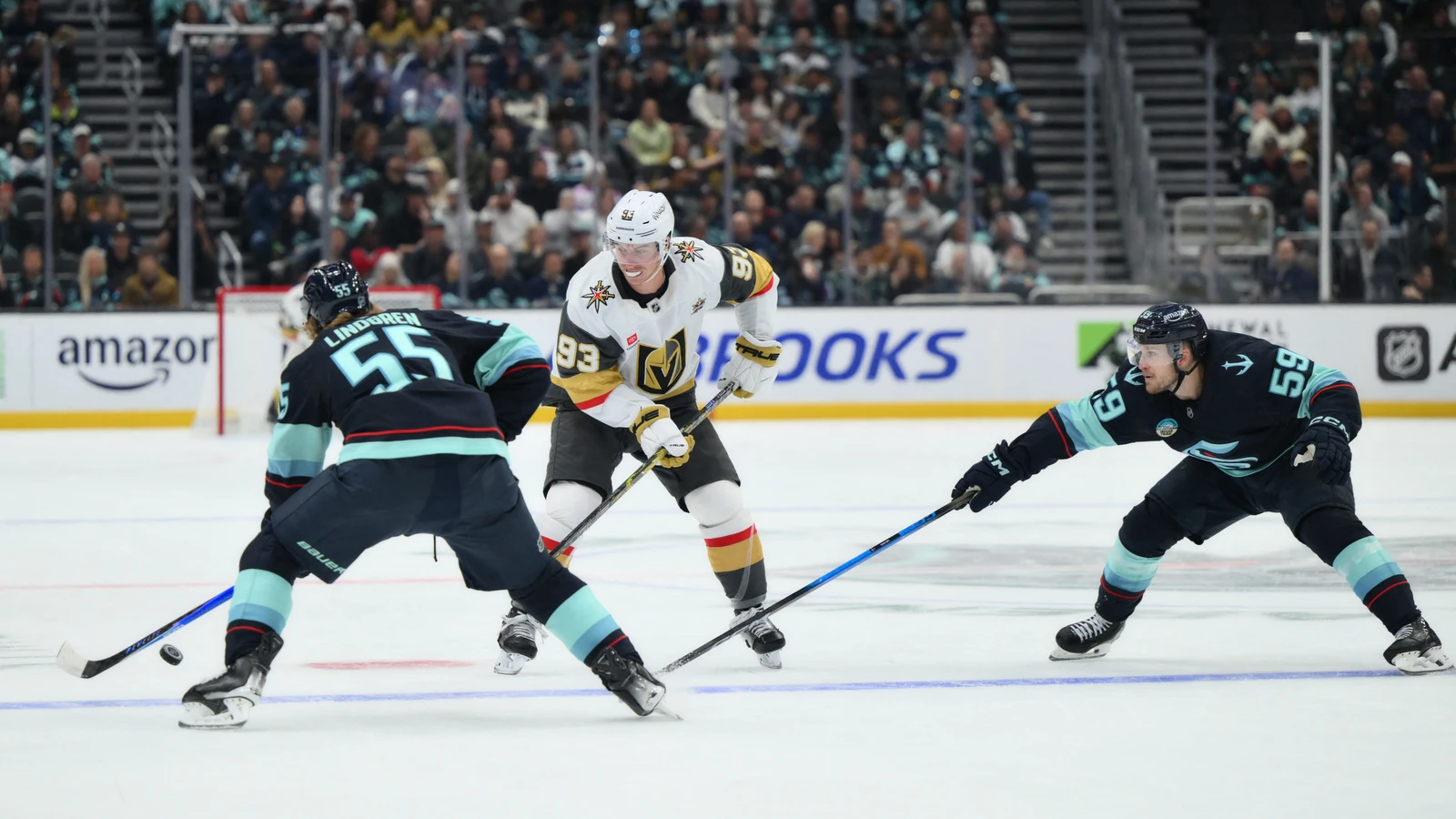 File photo: Seattle Kraken defenceman Ryan Lindgren faces Vegas Golden Knights forward Mitch Marner at Climate Pledge Arena.