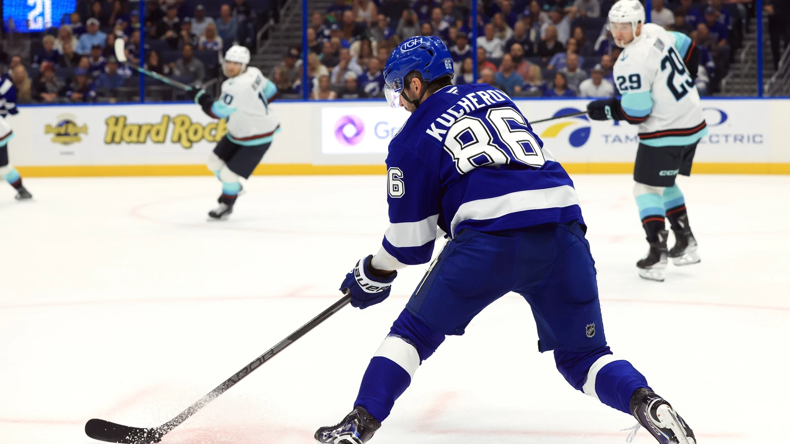 File photo: Tampa Bay Lightning forward Nikita Kucherov skates with the puck against the Seattle Kraken.