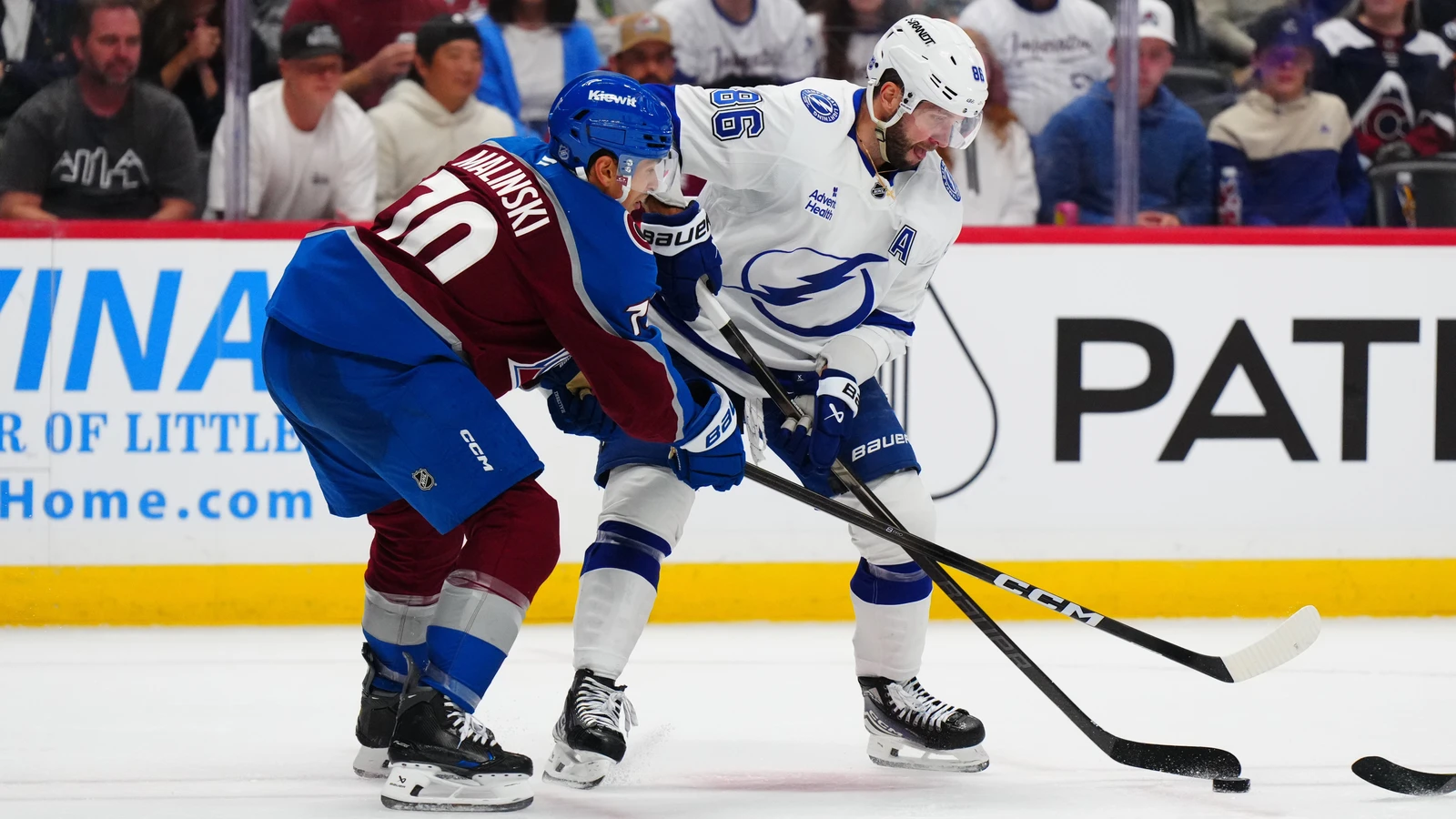 File photo: Tampa Bay Lightning forward Nikita Kucherov battles for the puck against Colorado at Ball Arena.
