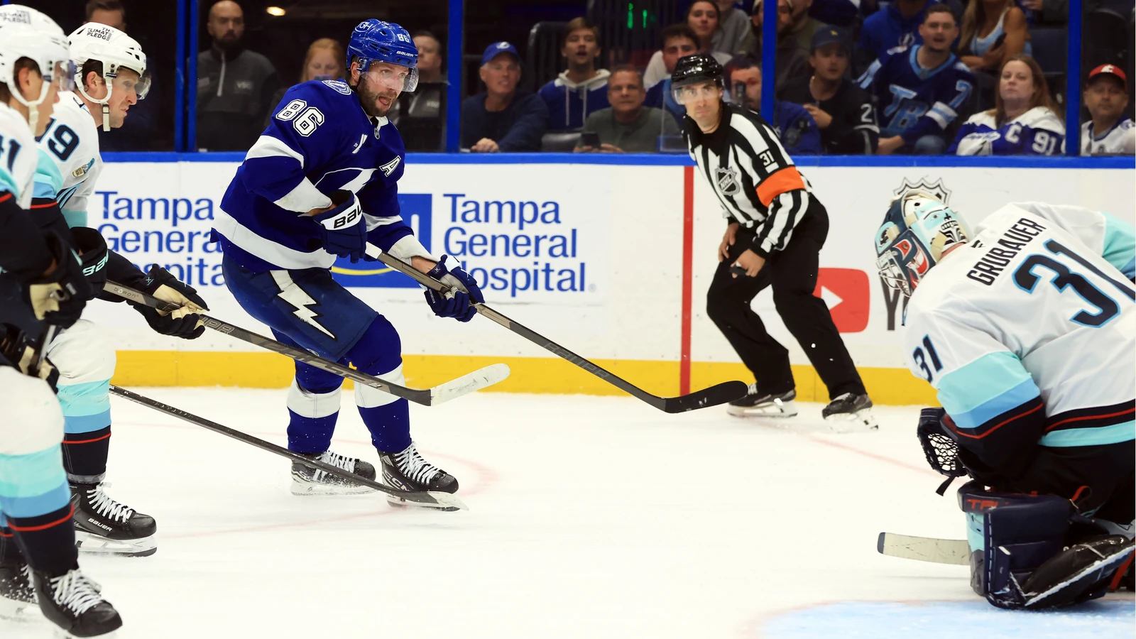 File photo: Tampa Bay Lightning forward Nikita Kucherov shoots towards the Seattle Kraken net at Benchmark International Arena.