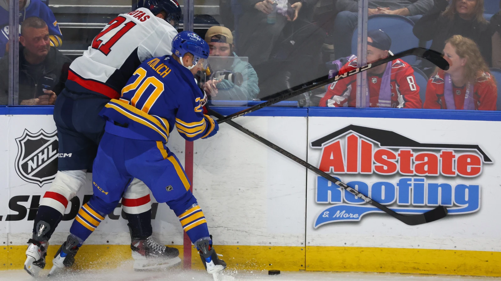 Jiri Kulich checks Aliaksei Protas during Buffalo's Nov. 1, 2025 game against Washington. File photo.