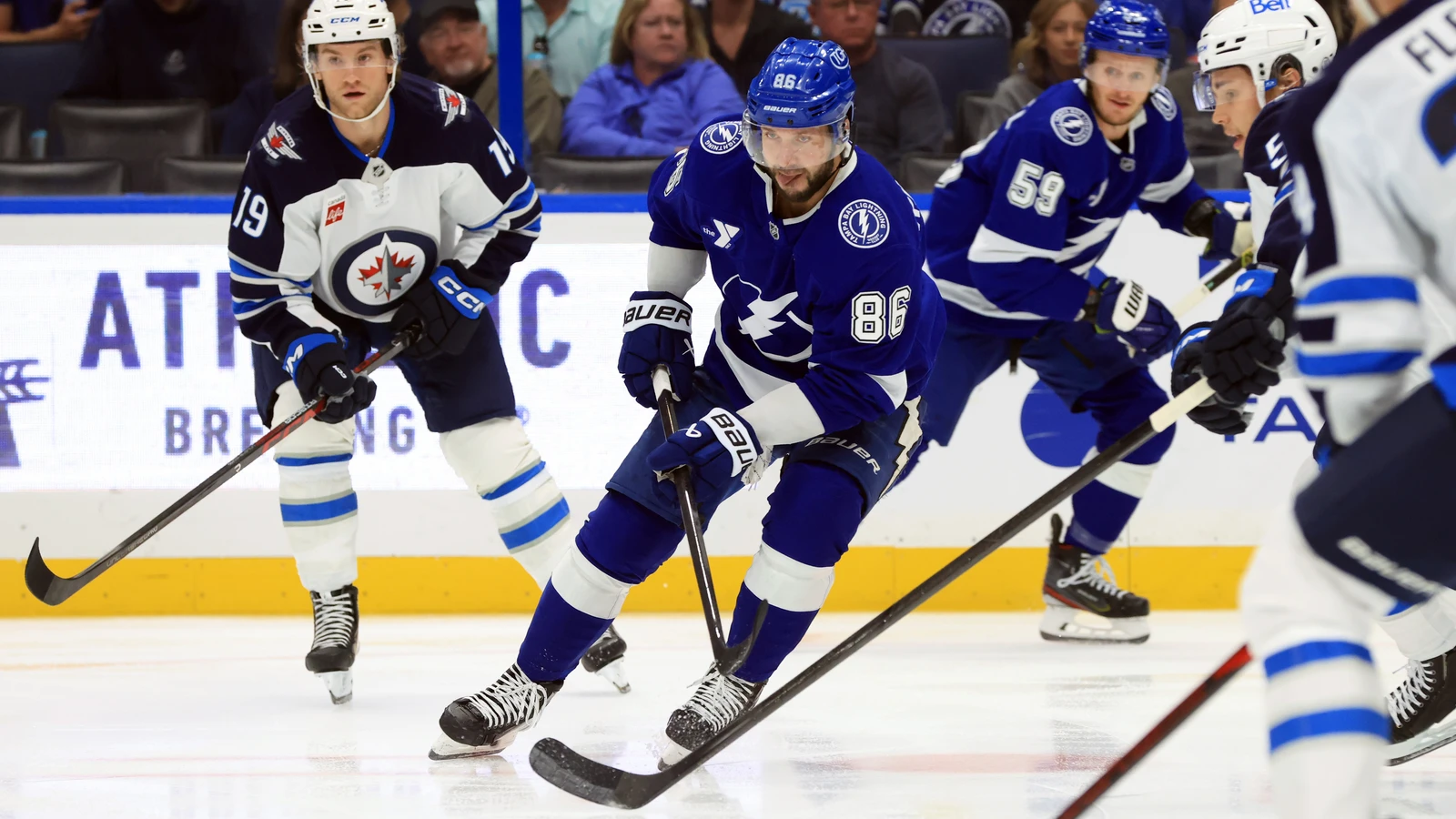 File photo: Tampa Bay Lightning winger Nikita Kucherov skates with the puck against the Winnipeg Jets.