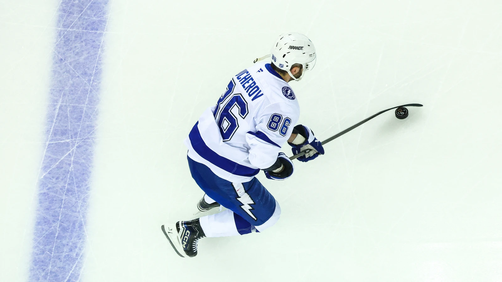 File photo: Tampa Bay Lightning forward Nikita Kucherov skates with the puck during warmup at Scotiabank Saddledome in Calgary on March 22, 2026.