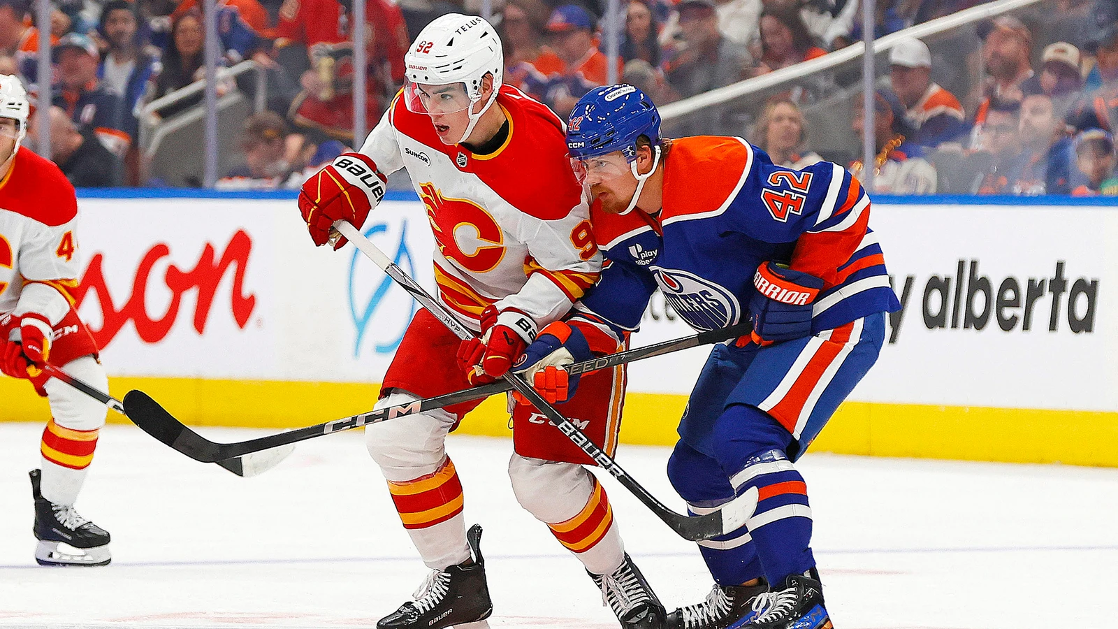 Mace'o Phillips battles Kasperi Kapanen at Rogers Place in Edmonton on October 8, 2025. File photo.