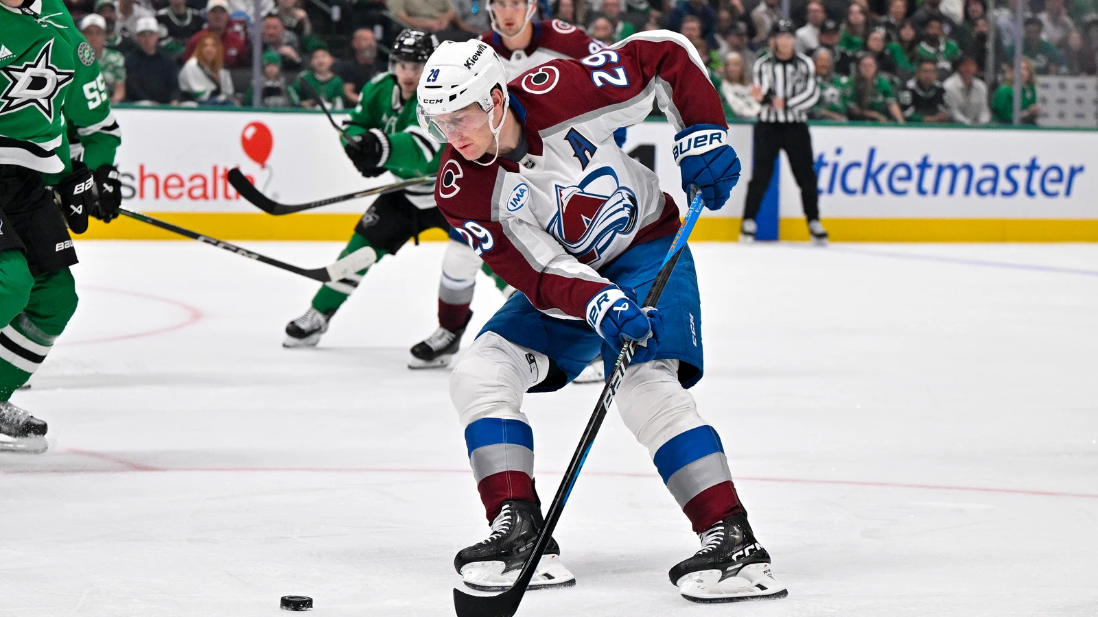 File photo: Colorado Avalanche centre Nathan MacKinnon skates with the puck against Dallas at American Airlines Center.