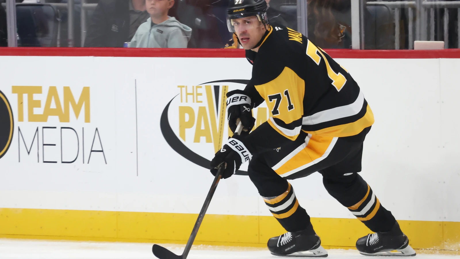 File photo: Pittsburgh Penguins forward Evgeni Malkin skates with the puck against the Florida Panthers at PPG Paints Arena.