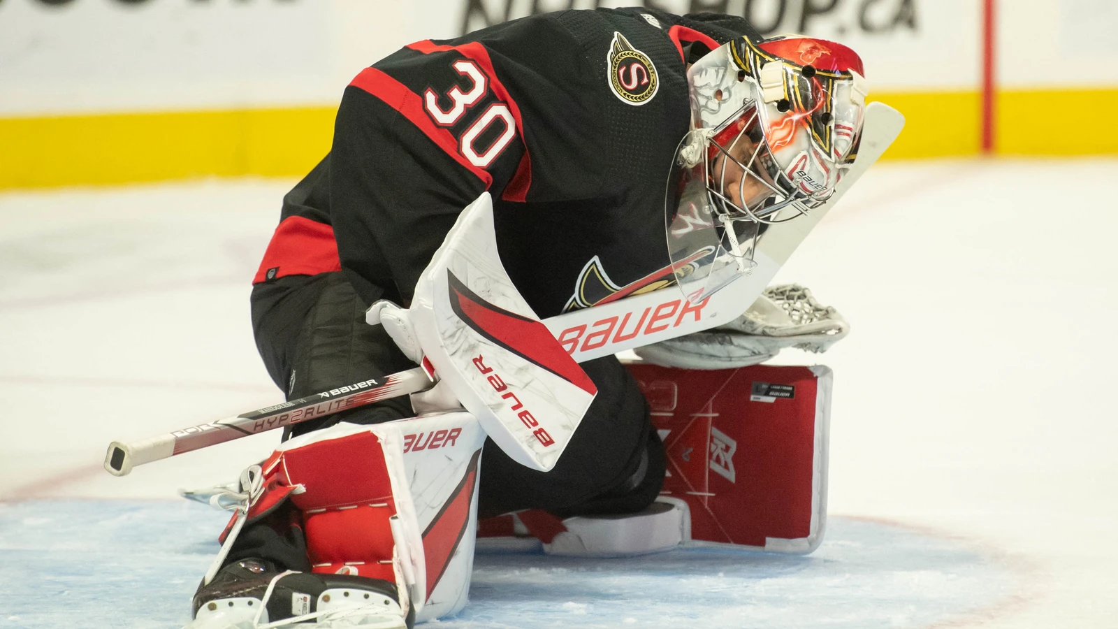 Ottawa Senators goaltender Kevin Mandolese stretches during a preseason game against Winnipeg on September 29, 2023. File photo.