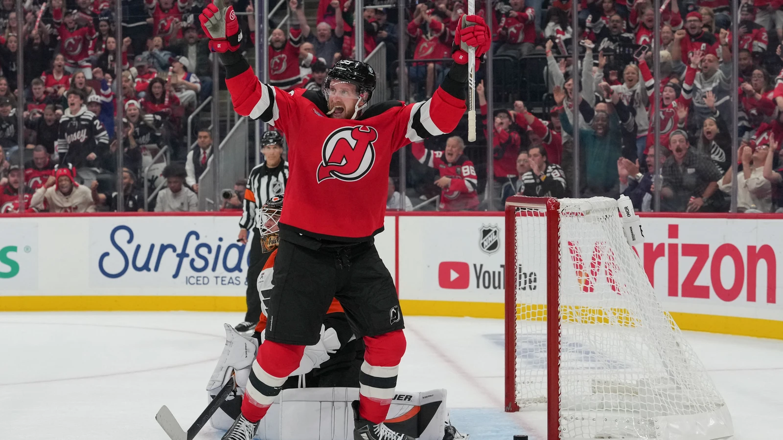 File photo: New Jersey Devils forward Anthony Mantha raises his arms to celebrate a goal against the Philadelphia Flyers in Newark.