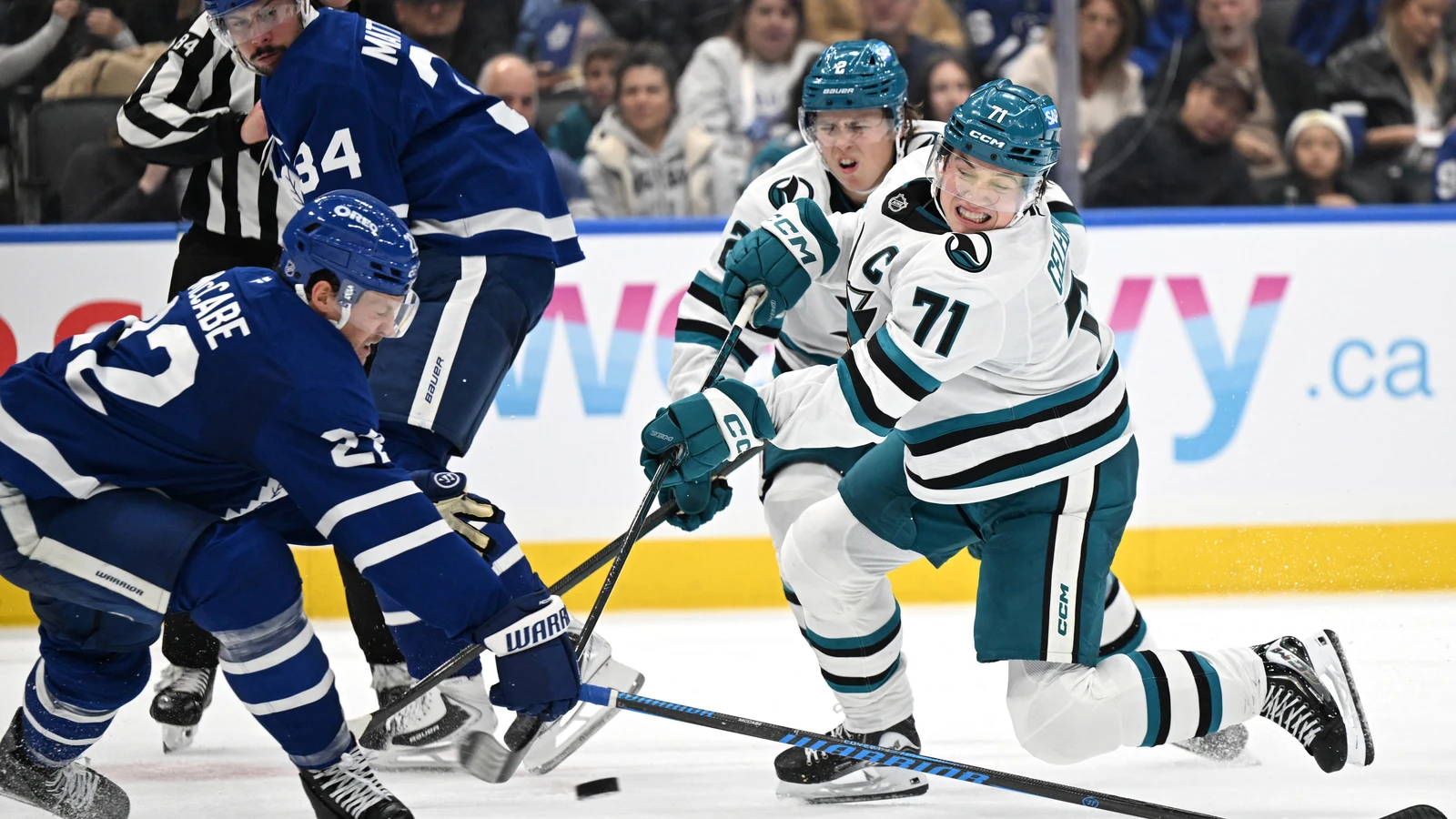 File photo: Toronto Maple Leafs defenceman Jake McCabe defends as San Jose Sharks forward Macklin Celebrini shoots the puck at Scotiabank Arena.