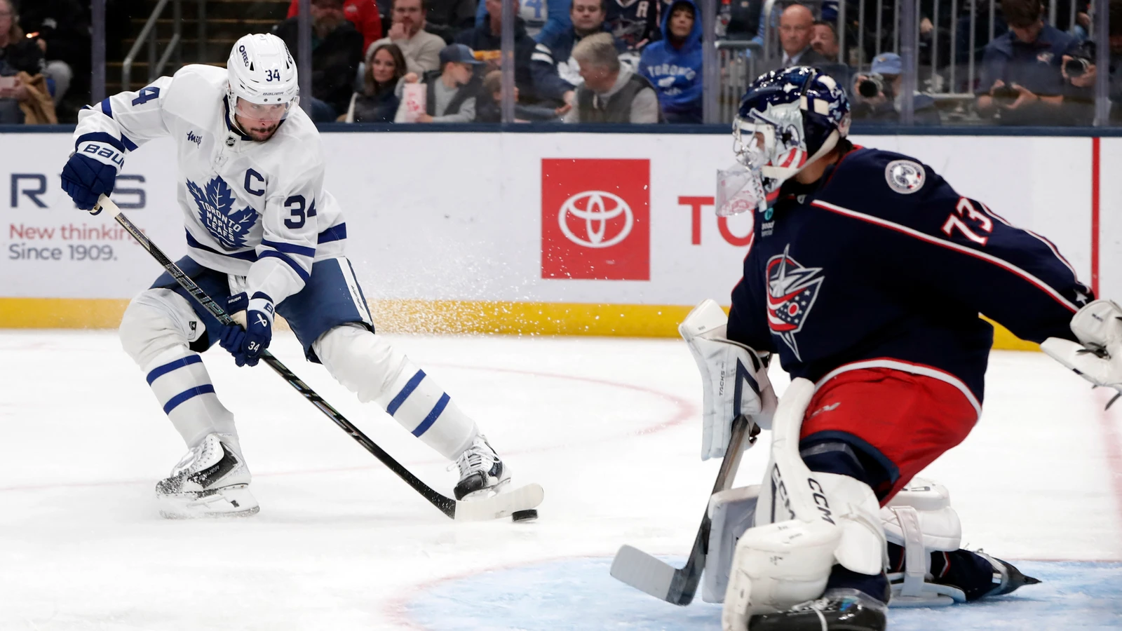 Auston Matthews shoots toward Jet Greaves during Toronto’s game in Columbus.