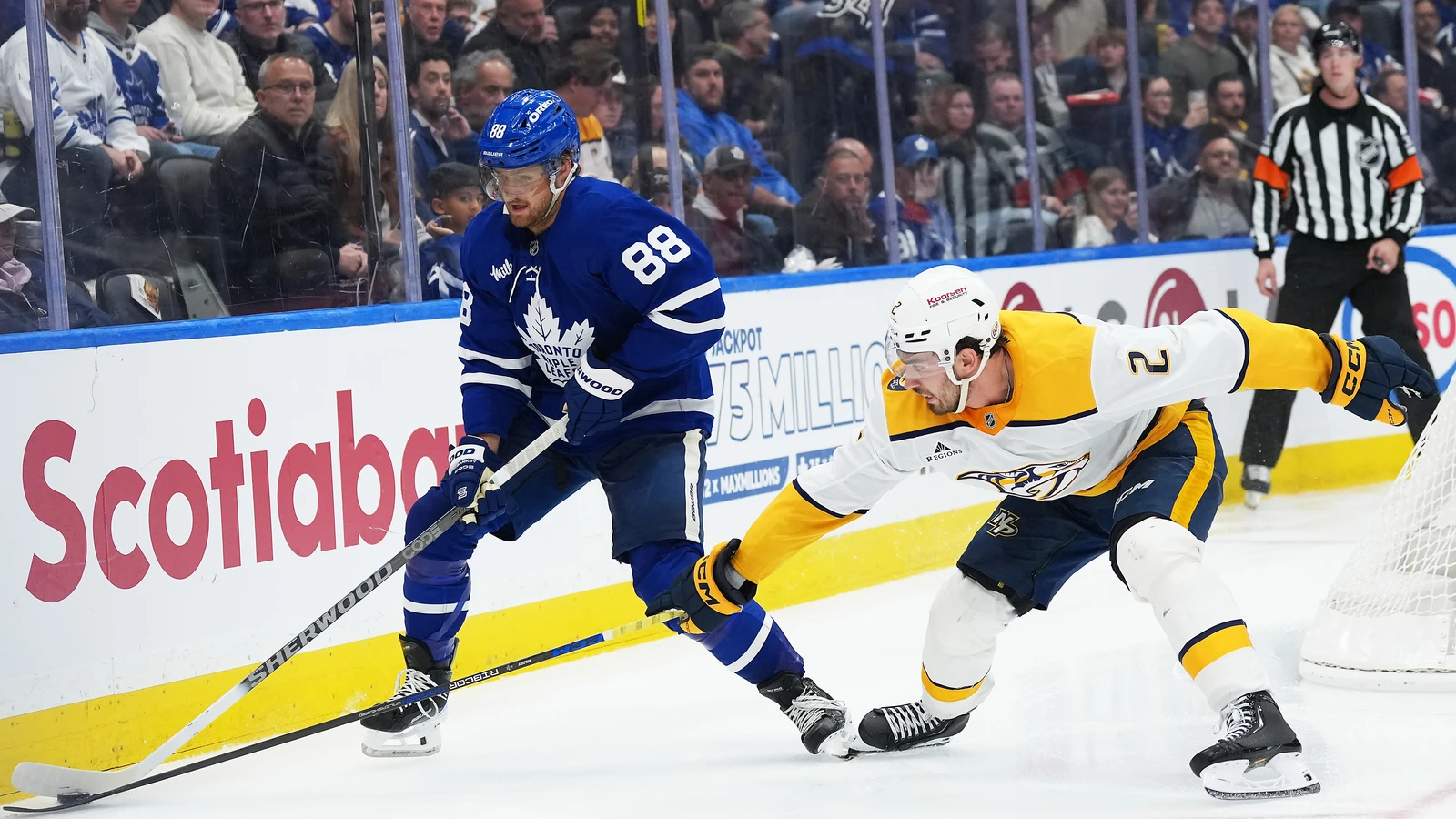 File photo: Toronto Maple Leafs forward William Nylander battles for the puck along the boards against Nashville at Scotiabank Arena.