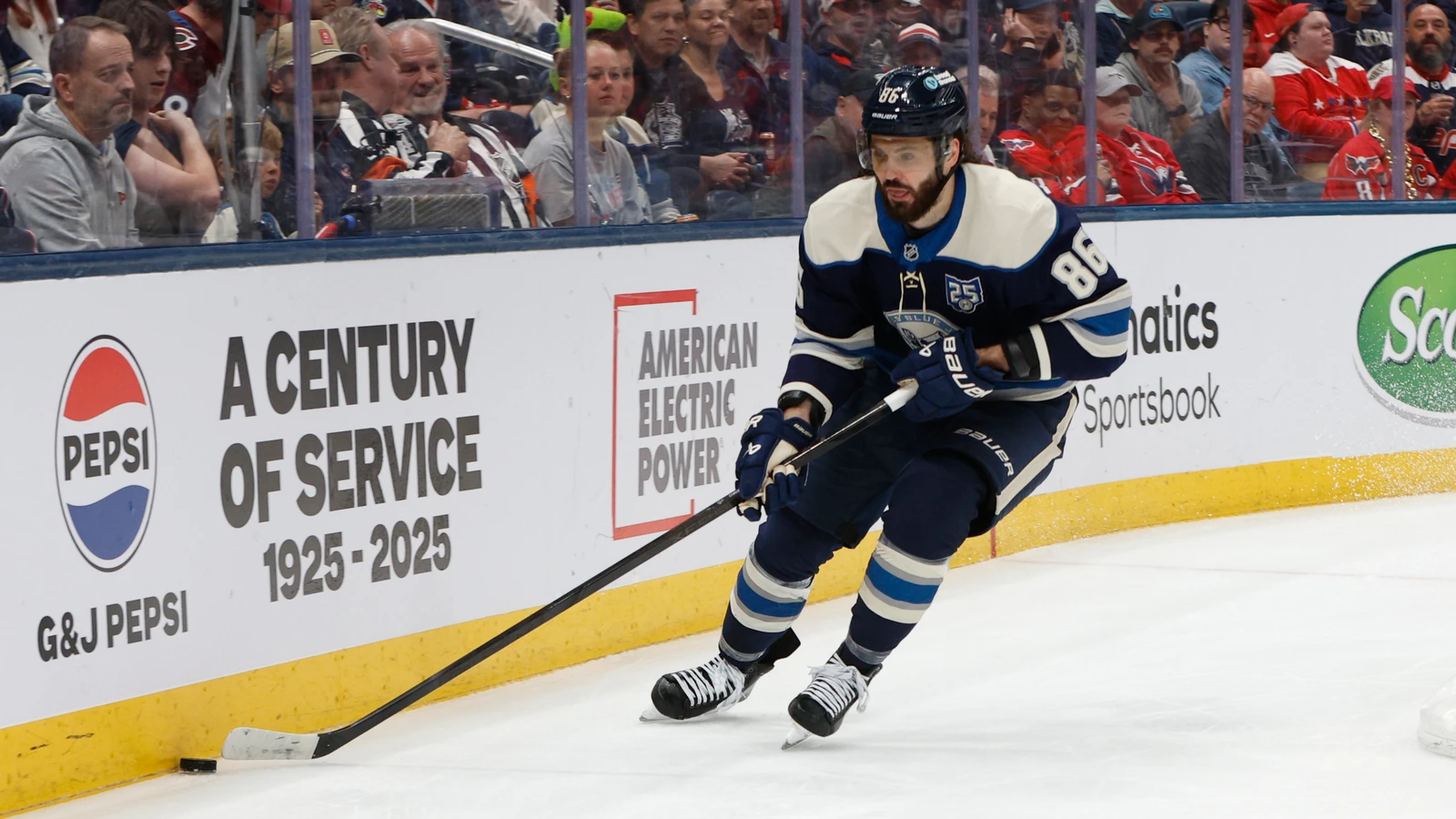 Kirill Marchenko carries the puck for Columbus against Washington in April 2026. File photo.
